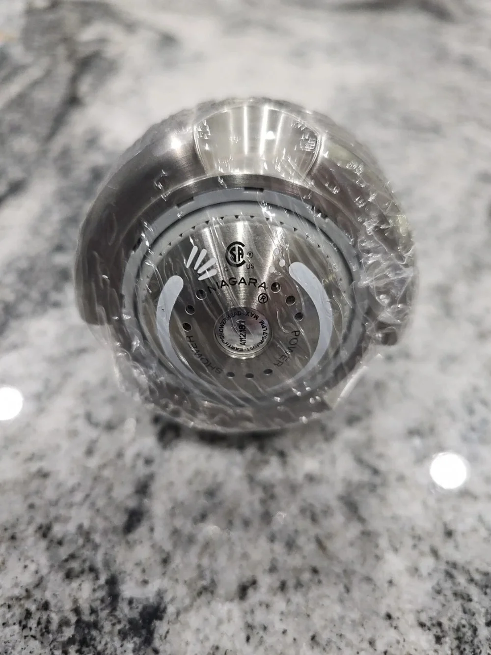 This is a Niagara Conservation N2915BN Earth Spa 3-Spray Showerhead with a brush